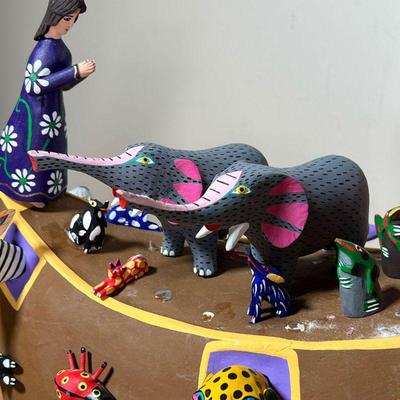 MOISES JIMENEZ (MEXICAN, 20TH C)  |
Mexican (Oaxaca) folk art carvings, Noah's arc with carved and painted wood animals and figures - l....