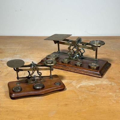 (2pc) BRASS POSTAL SCALES  |
Brass postage scales with assortments of weights
- l. 10-1/2 x w. 5-1/4 x h. 3-1/2 in - (largest)