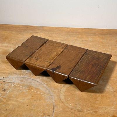 (3pc) ANTIQUE WOOD BOXES  |
Including an unusual four-part box that rolls to open fully flat (patented 1889), plus a miniature tool box...