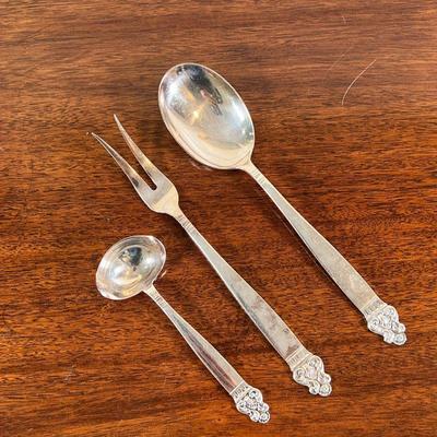 (3pc) T.H. MARTINSEN STERLING SERVING PIECES  |
Including a serving spoon, pickle tongs, and a cream ladle - l. 10 in. (largest)