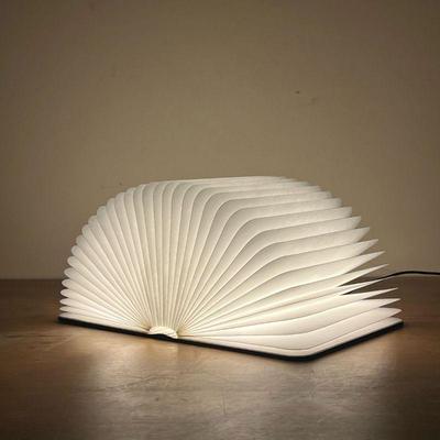LUMIO SF PORTABLE LAMP  |
Multi-functional portable lamp that folds into a wooden bound book.