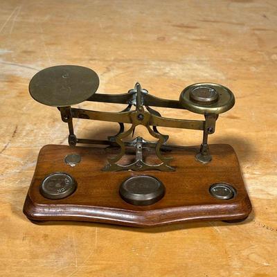 (2pc) BRASS POSTAL SCALES  |
Brass postage scales with assortments of weights
- l. 10-1/2 x w. 5-1/4 x h. 3-1/2 in - (largest)