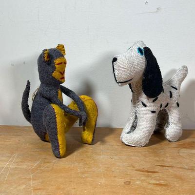 (2pc) STUFFED ANIMALS  |
Handmade stuffed animal figures, dense, neither appearing to be signed - l. 8-1/2 x h. 8 in. (dog)