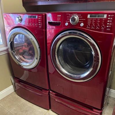 LG washer and dryer set. Pedestals included  
