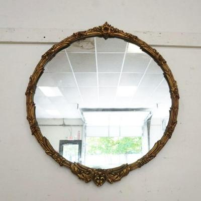 1140	MIRROR IN ORNATE GILT DECORATED CIRCULAR FRAME, MIRROR DISCOLORED, 30 IN X 34 IN
