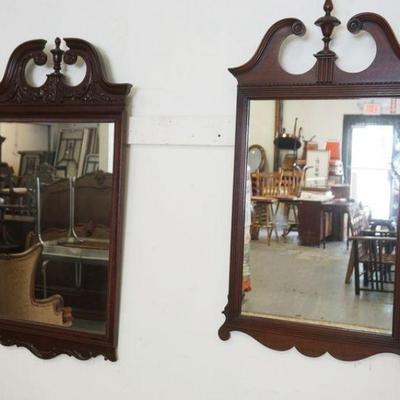 1099	2 MAHOGANY HANGING MIRRORS W/SCROLL & FINIAL CRESTS, LARGEST IS APPROXIMATELY 24 IN X 43 IN HIGH
