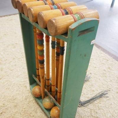 1120	ANTIQUE CROQUET SET IN ORIGINAL WOOD HOLDER, APPROXIMATELY 17 IN X 29 IN HIGH
