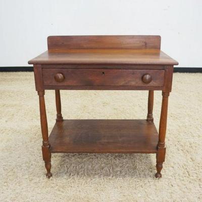 1067	ANTIQUE PINE ONE DRAWER TABLE W/BACK SPLASH, APPROXIMATELY 32 IN X 19 IN X 34 IN HIGH
