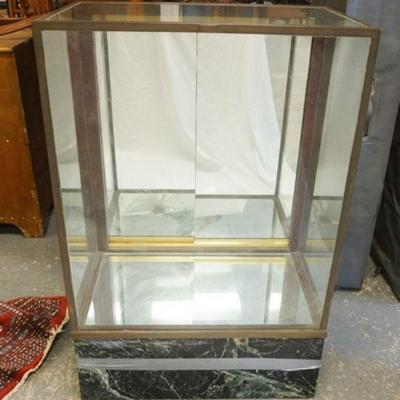1257	SHOWCASE W/BRASS TRIM & CASED MARBLE BASE, MIRROR BACK, SLIDING DOORS, NO SHELVES, APPROXIMATELY 18 IN X 30 IN X 46 IN
