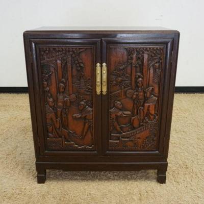 1079	2 DOOR HEAVILY CARVED ASIAN CABINET W/6 INTERIOR DRAWERS, APPROXIMATELY 36 IN X 18 IN X 42 IN
