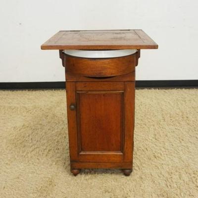 1066	ANTIQUE WALNUT ONE DOOR FLIP TOP COMMODE, APPROXIMATELY 22 IN X 21 IN X 34 IN HIGH
