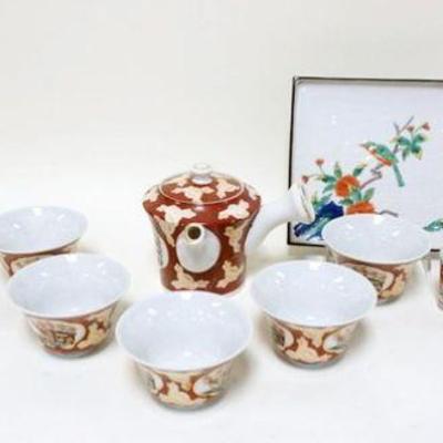 1007	GROUP OF ASSORTED ASIAN CHINA INCLUDING TEAPOT & CUPS & SQUARE 6 3/4 IN TILE LIKE PLATE, ONE SMALLER CUP W/CHIP
