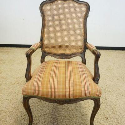 1104	FRENCH STYLE UPHOLSTERED ARMCHAIR W/CANE BACK

