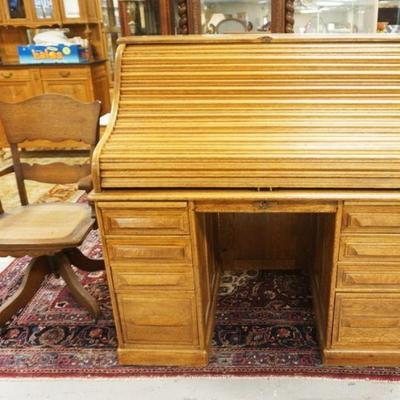 1118	ANTIQUE SOLID OAK CUTLER ROLL TOP DESK W/CHAIR, APPROXIMATELY 49 IN X 32 IN X 50 IN HIGH
