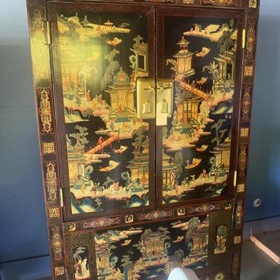 Jaw dropping oriental armoire 