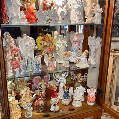 Large collection of various angel figurines 