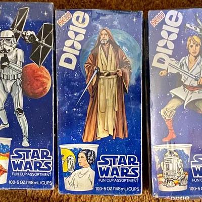 Unopened Dixie cups with vintage Star Wars characters 