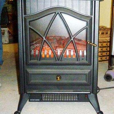 electric flaming log stove