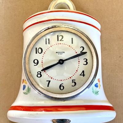 Howard Miller 8-day key-wind porcelain wall clock