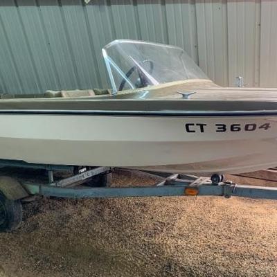 14 1/2 ft. Glastron fiberglass boat with 50 hp Mercury outboard and trailer.  Extremely low hours.  Always stored indoors.