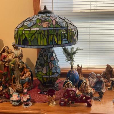 religious decor and tiffany style lamp 