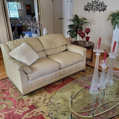 All leather loveseat  glass brass coffee