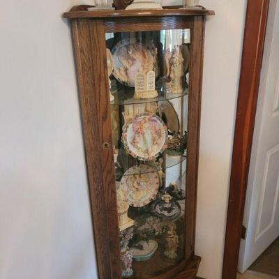 very nice curio cabinet, contents sold separately