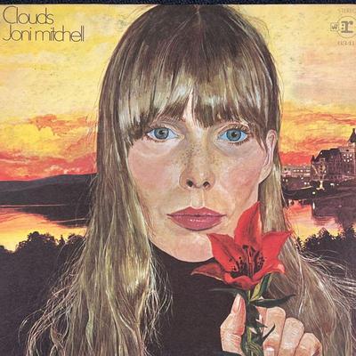 (2pc) JONI MITCHELL VINYL  |
Vinyl record albums by Joni Mitchell, including her self-titled album (RS 6293) and Clouds (RS 6341)