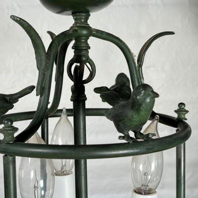 WHIMSICAL BIRD CHANDELIER  |
bronze with faux electrified candles, small size mounting three birds with three lights in a cage - h. 14 x...