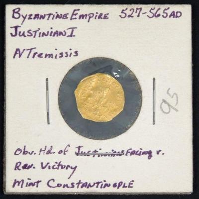 Lot 70: Byzantine Justinian I (527 - 565 AD), AV Tremissis Gold Coin.
