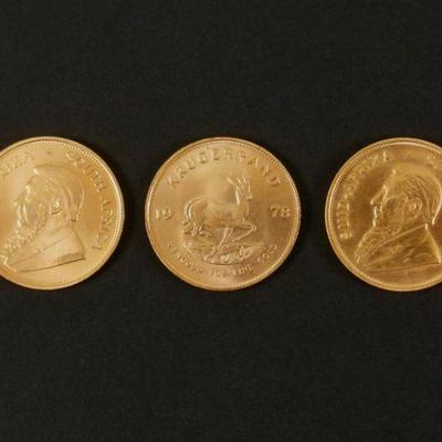 LOT 135: (3) South African 1 oz. Gold Krugerrands.