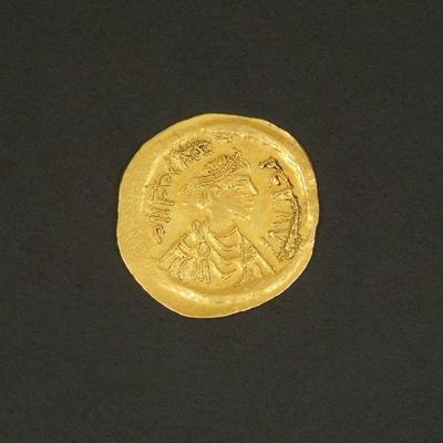 Lot 69: Byzantine Phocas (602 - 610 AD), Semissis Gold Coin.
