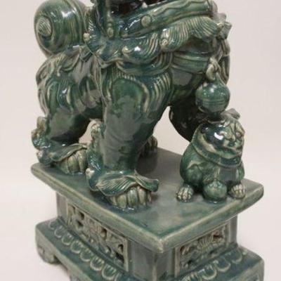 1151	LARGE CONTEMPORAY GREEN GLAZED POTTERY FOO DOG, APPROXIMATELY 18 IN HIGH
