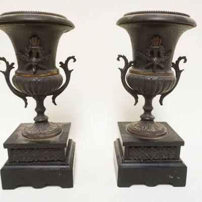 1094	PAIR OF MINIATURE METAL URNS ON SLATE BASES, APPROXIMATELY 9 1/2 IN HIGH
