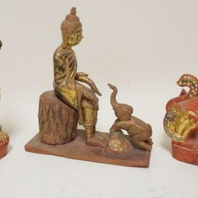 1154	LOT OF 3 TIBETIAN CARVED WOODEN FIGURES, LARGEST IS APPROXIMATELY 9 IN HIGH
