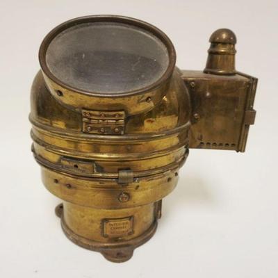 1056	BRASS SHIP COMPASS ENCLOSED IN CASE SIMILAR TO DIVING HELMET, APPROXIMATELY 11 IN HIGH
