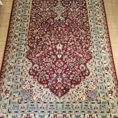 Large Woven Oriental Area Rug is 79.5in w x116in 