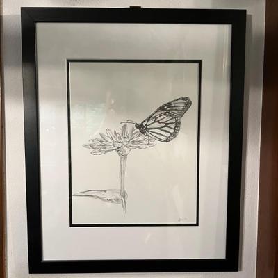 pencil drawing a butterfly on a flower, signed