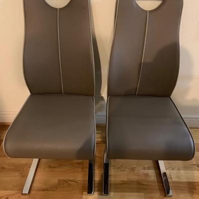 Contemporary Z-Shaped Leather Dining Chairs ( there are 4 of these)