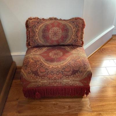 Adorable upholstered stool with matching pillow.