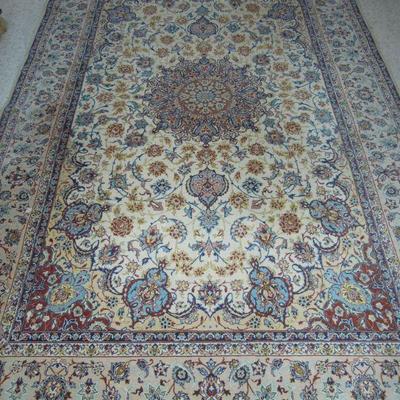 Fine hand knotted Persian rug.  Signed.