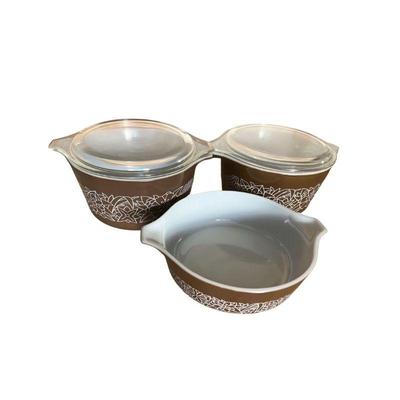 trio of vintage Pyrex brown "Woodland" pattern casserole dishes