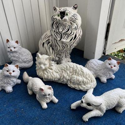 collection of white midcentury ceramic cats
