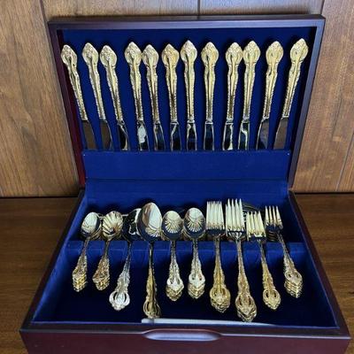 gold electroplated flatware in case