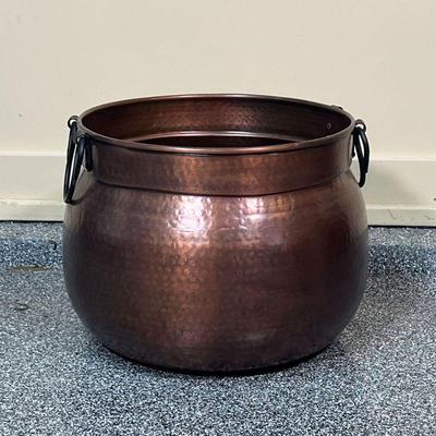 HAMMERED COPPER POT  |
Of large size, round decorative pot or planter with side handles - h. 14 x dia. 17 in.