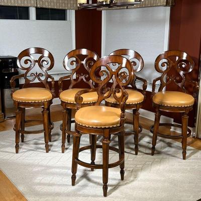 (5pc) SET BARSTOOLS  |
Very nice Frontgate bar stools with dark wood and contrasting edges, having scrolled backrests and armrests,...