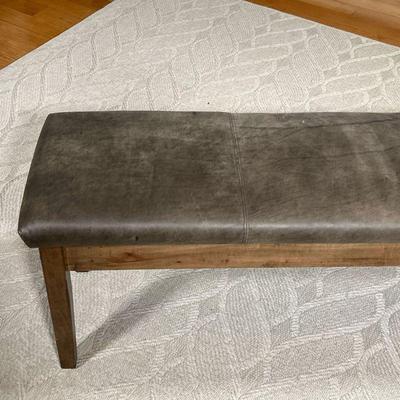 BASSETT FURNITURE LEATHER BENCH  |
Having a cushioned distressed gray leather top on a wooden frame - l. 70 x w. 15 x h. 20 in.
Purchased...