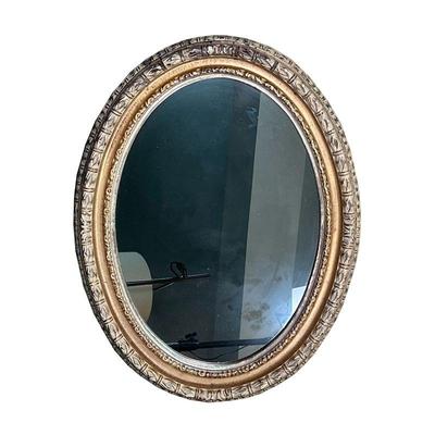 FANCY OVAL WALL MIRROR  |
Bombay Company, carved framed mirror with metallic accents - w. 26 x h. 33 in.