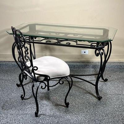 (2pc) WROUGHT IRON DESK & CHAIR  |
Bombay Company set, including a wrought iron table / desk with a beveled glass top, plus a matching...