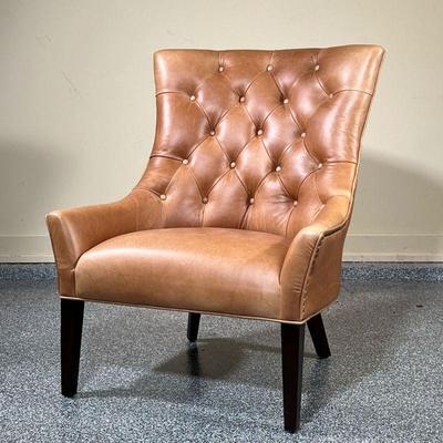 POTTERY BARN LEATHER ARMCHAIR  |
Distressed brown leather with a tufted back - l. 29 x w. 31.5 x h. 38 in.
